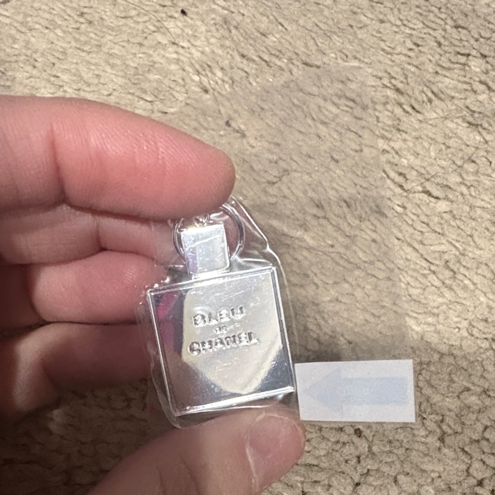 Brand new authentic Chanel bleu silver pendant charm